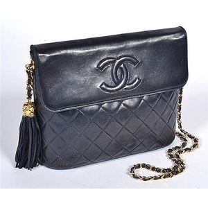 Sold at Auction: Chanel, a handbag made of dark blue/black leather with gold -plated hardware. Circa 1970. (W: 25 x H: 19 cm)