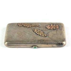 An engraved silver and gold mounted cigarette case, Russian,…