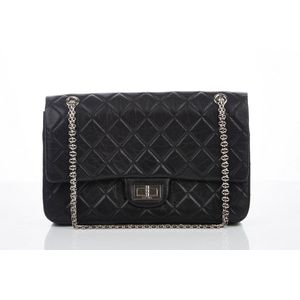 Paris, France – March 3, 2020: Burgundy Leather Chanel Handbag