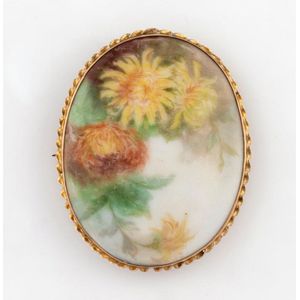 A 9ct gold mounted oval miniature floral painting on porcelain,…