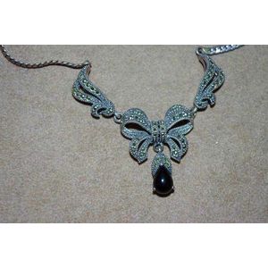 Sterling silver backed marcasite necklace with black onyx drop