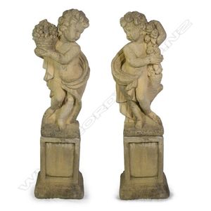 A pair of allegorical church stone garden cherubs, Spring and…