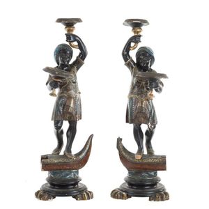 A pair of Italian blackamoor pedestals, original polychrome…