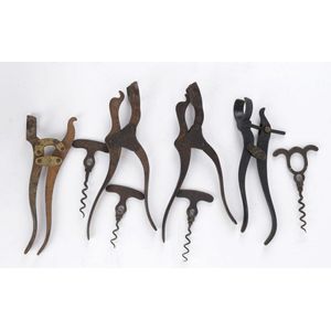 Four lever action antique corkscrews including Lund and Tangent,…