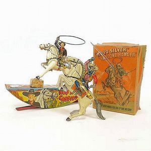 Two tinplate clockwork cowboys, including 'Hop Along Cassidy',…