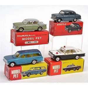 Four model Pet (Japan) models, including 5 Datsun Bluebird; 9S…
