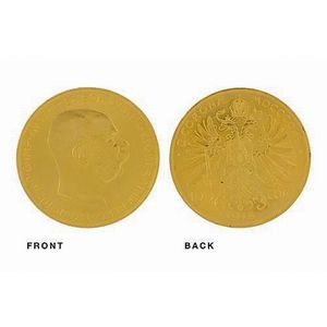 An Austrian 100 Corona gold coin; featuring Franz Joseph 1915.…