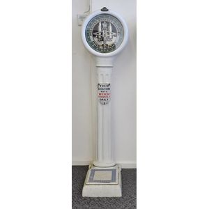 Peerless coin operated weighing machine. White enameled column…