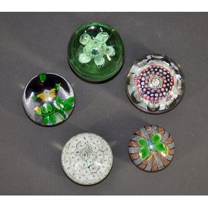 Five various glass paperweights, including two millefiori and…