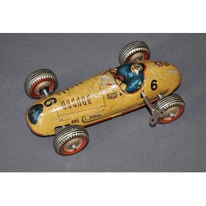 British tinplate racing car. Clockwork motor, steerable body.…