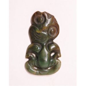 A pre-European Maori carved pounamu hei tiki, with head turned…