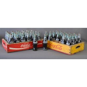 Two full Coca Cola crates. Original wooden yellow crates and…