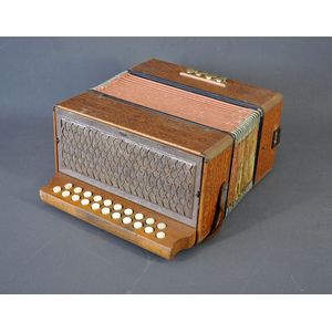 Hohner 21 button Accordion. Pressed pattern wood case with some…