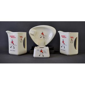 Four various Johnnie Walker earthenware advert items, including…