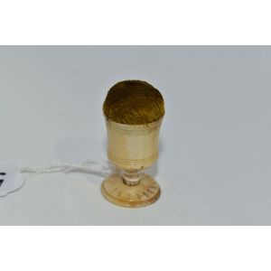Antique pin cushion, carved ivory chalice with mustard velvet…