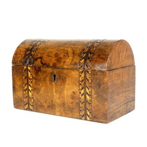 A Victorian walnut dome top tea caddy, with marquetry inlay,…