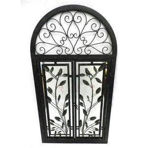 A wrought iron mirror with bird and floral opening doors, 140 x…