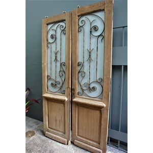 A pair of 19th century French decorative glazed and wrought…