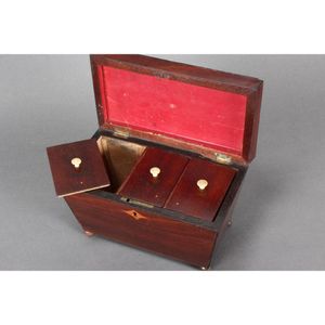 19th century tea caddy, in mahogany, of tapering facetted form,…