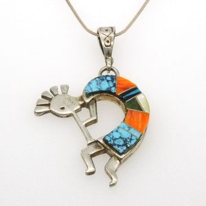 Mexican silver figure pendant with mixed gem Slabs, including…
