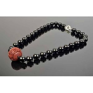 Onyx bead necklace, the beads measuring approximately 12 mm…
