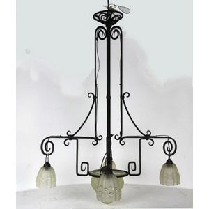 A French Art Deco wrought iron and moulded glass electrolier,…
