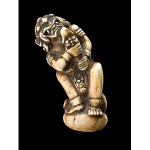 Bali, handle, ivory modelled in the form of a demonic figure…