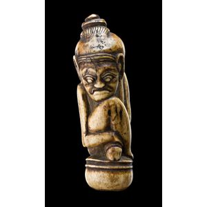 Bali, handle, bone modelled in the form of a priestly figure…