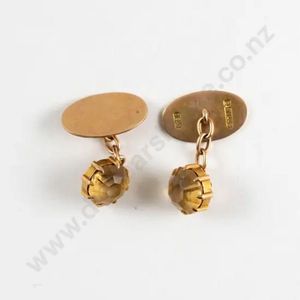 Pair of bronze cuff links | Science Museum Group Collection