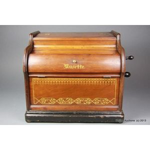 A mahogany 'Musette' crank organ music box, with rolls, circa…