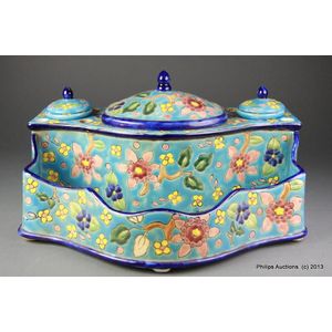 A French faience inkwell, circa 1950s, rectangular with a…