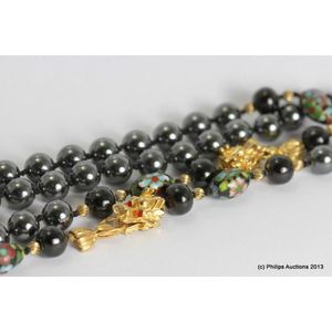 Measuring 70 cm in length the hematite and jet bead necklace is&hellip;