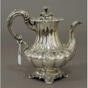 An early 19th century Sheffield plate coffee pot of tall…