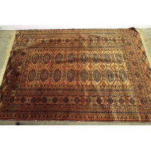 A finely hand knotted Tekke Bokhara rug with multiple borders…