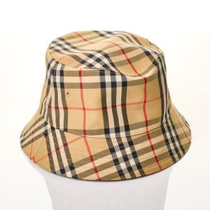 A Burberry bucket hat. Made in Italy. Exterior is crafted from&hellip;