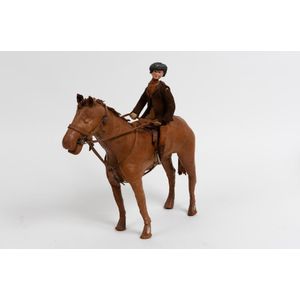 A leather and skin model of a horse and rider by Edith Reynolds,…