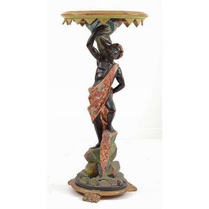 A Venetian polychrome blackamoor figure the standing female…