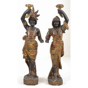 A floor standing pair of Venetian polychrome blackamoor figures…