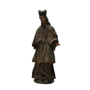 An early timber Santos figure, height 43 cm
