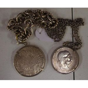 Two Austrian silver coin pendants and chains dated 1780 and…