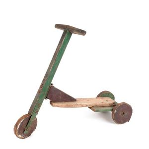 A depression era scooter, painted wood and iron, circa 1930s 58…