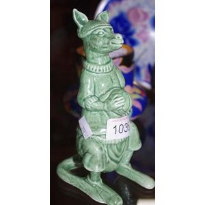 Green matt glazed figure of Kangaroo playing Cricket, marked…