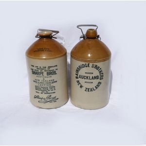 Two early salt glaze Tui vinegar demijohns, with impressed Tui…