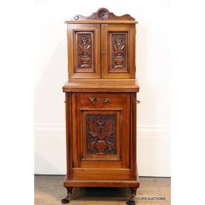 An Edwardian walnut coal scuttle cabinet, early 20th century,…