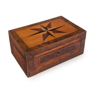 An antique box with starburst top, various timbers including…
