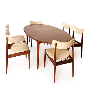 A Parker teak and blackwood dining suite, C. 1960. The oval…