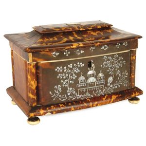 A good George III tortoiseshell bowfront tea caddy, the flared…