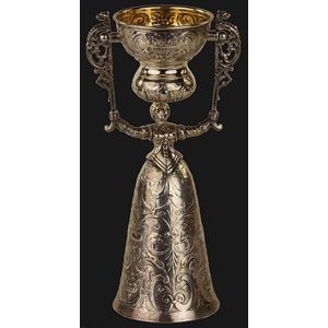 German silver plated wager cup, modelled as a lady with full…