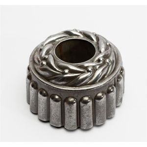 A small round steel jelly mould French, 19th century, diameter…