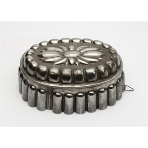 A large oval steel jelly mould French, 19th century, length 27.…